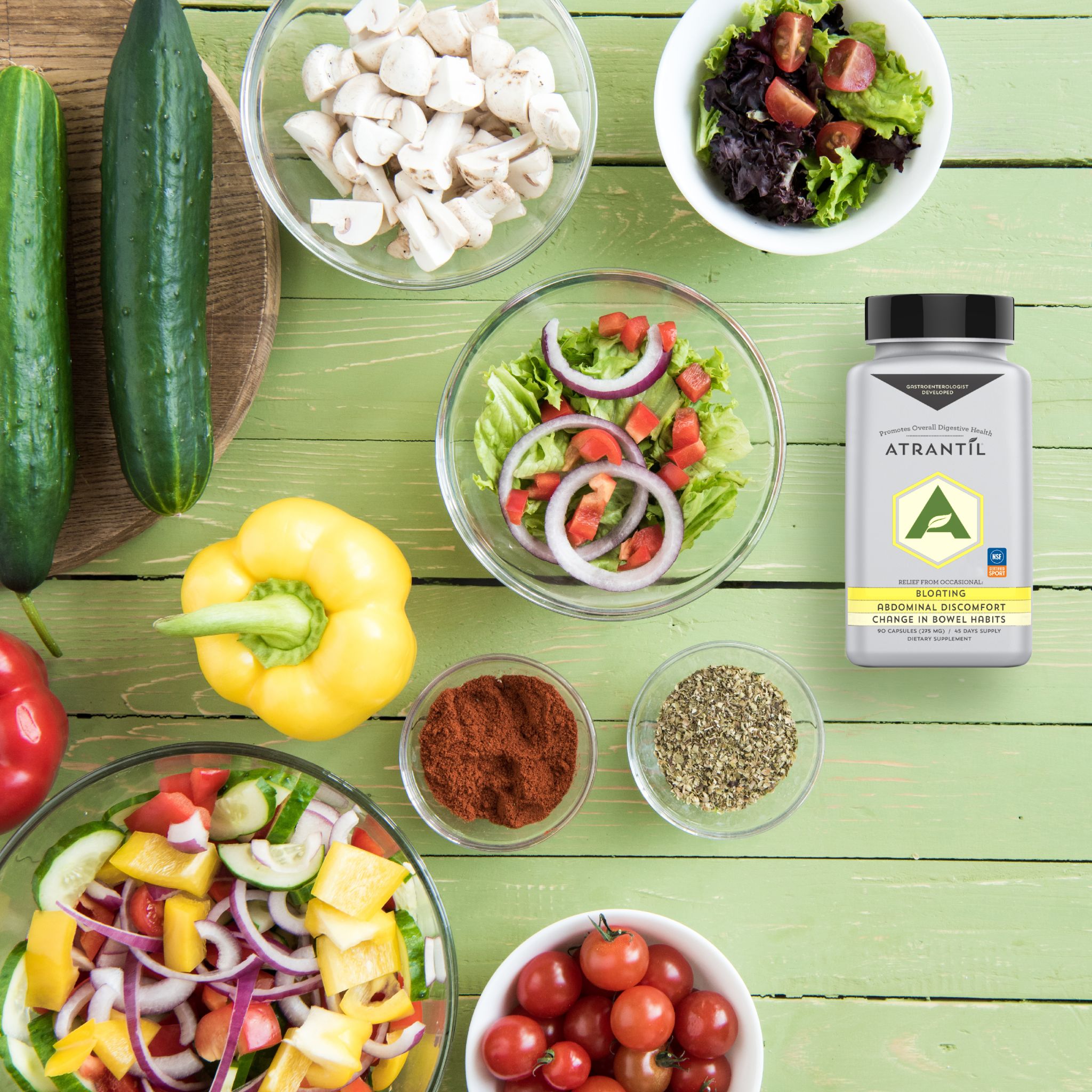 Food on a table next to a bottle of Atrantil